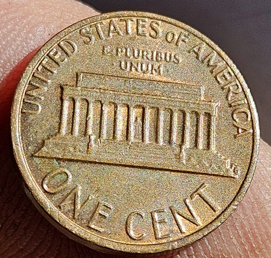 1982-Penny-Struck-Off-Center?