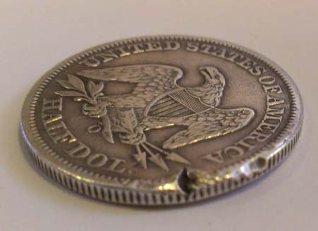 1859-O-Half-Dollar-Damaged---Good-Deal?