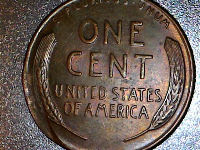 1953-S-Wheat-Penny.-Is-This-PMD-Or-A-Cud-Or-Something-Else?