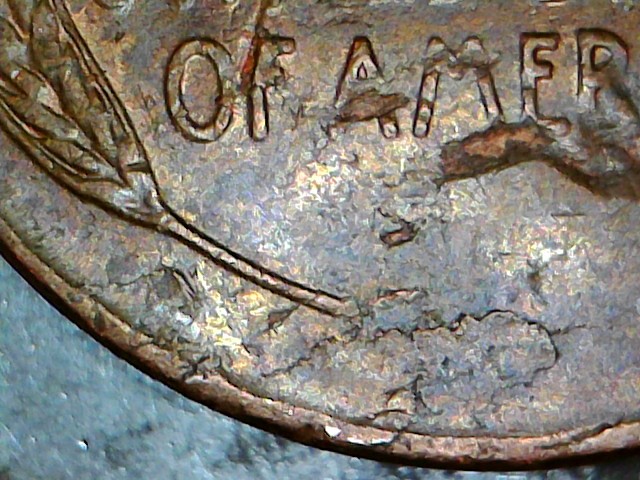 1957-D-Bie,-Plus-Struck-Thru-Debris,-Plus-Lamination,-Plus-Struck-Thru?