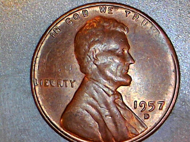 1957-D-Bie,-Plus-Struck-Thru-Debris,-Plus-Lamination,-Plus-Struck-Thru?