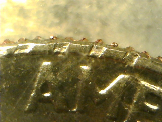 1965-Roosevelt-Dime-With-Rim-Damage