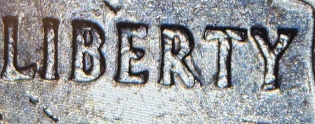 2004-D-Wisconsin-Quarter-Doubling-Errors?-An-R-With-Possible-A-On-It?