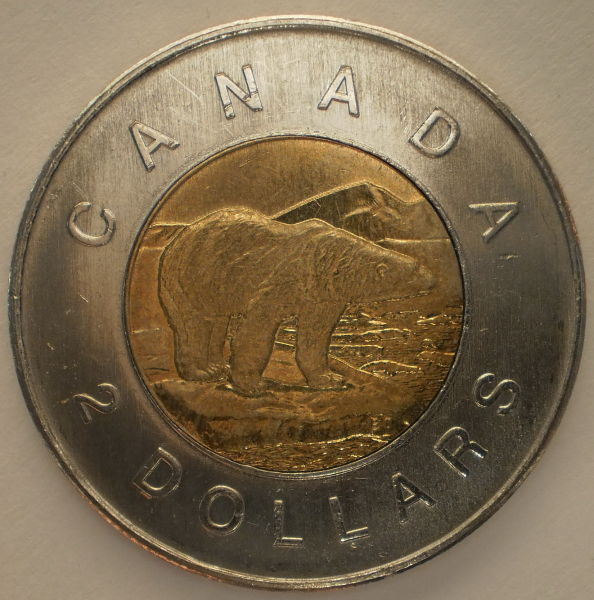 2011-Toonie-Pedestal-And-Struck-Through?
