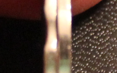 Toonie-Error-2008-Bent-/-Crushed-Rim-Edge