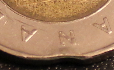 Toonie-Error-2008-Bent-/-Crushed-Rim-Edge