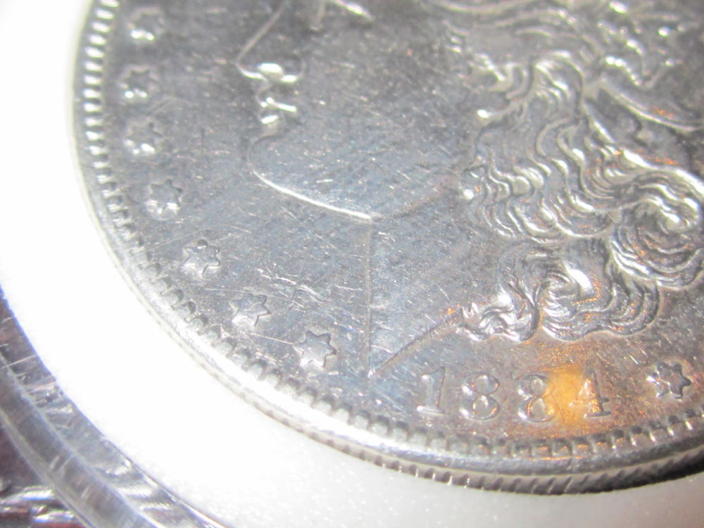 1884-S-Morgan-Scratched-And/Or-Cleaned?