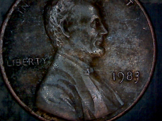 Strange-3-On-A-1983-Cent.what-Do-You-Think?