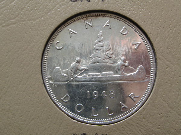 I-Need-Help-With-Grading-My-1948-Silver-Dollar
