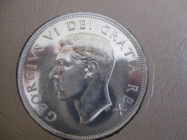 I-Need-Help-With-Grading-My-1948-Silver-Dollar