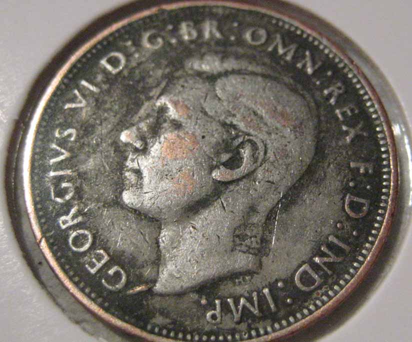 Strange-Raised-Mark-On-Half-Penny