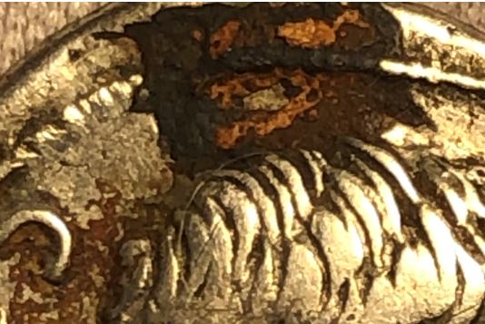 Cleaning-A-Deposit-And/Or-Encrustation-On-A-Silver-Coin.