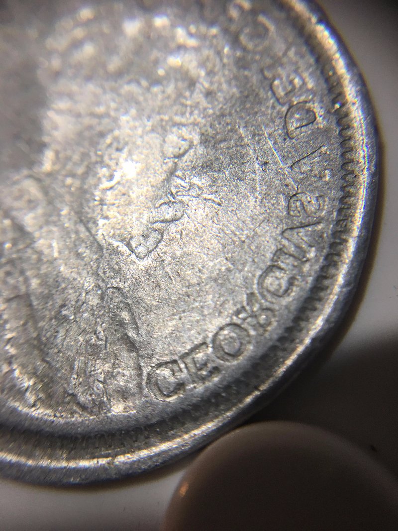Any-Idea-What-This-Could-Be?-Canadian-25c-Recessed/Reversed-