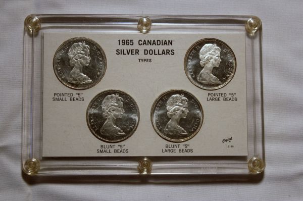 Help-With-Value-Of-1965-4-Pc-Silver-Dollar-Set