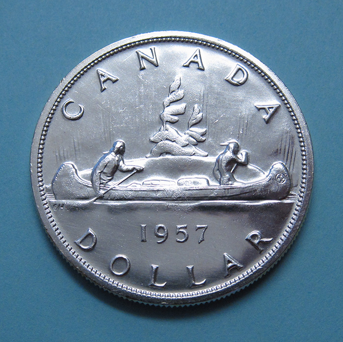 1957-One-Dollar-One-Water-Line-Polished-Die-Variety?