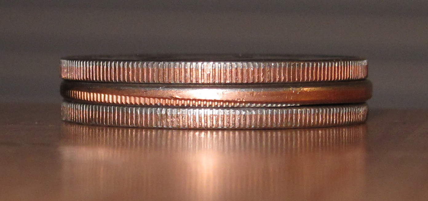 1976-D-Ike-Dollar-Tilted-Collar-Or-Double-Struck-In-Partial-Collar?