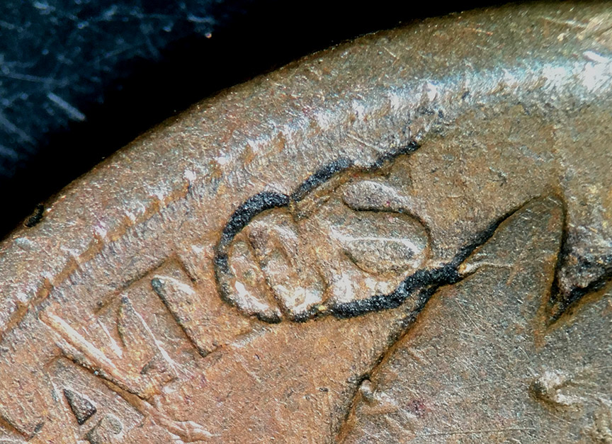 1901-Indian-Head-Cent---Cool-Struck-Through-Or-Damage