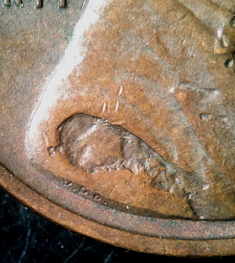 1923-Lincoln-Wheat-Cent-Mint-Error---Struck-Through-Debris