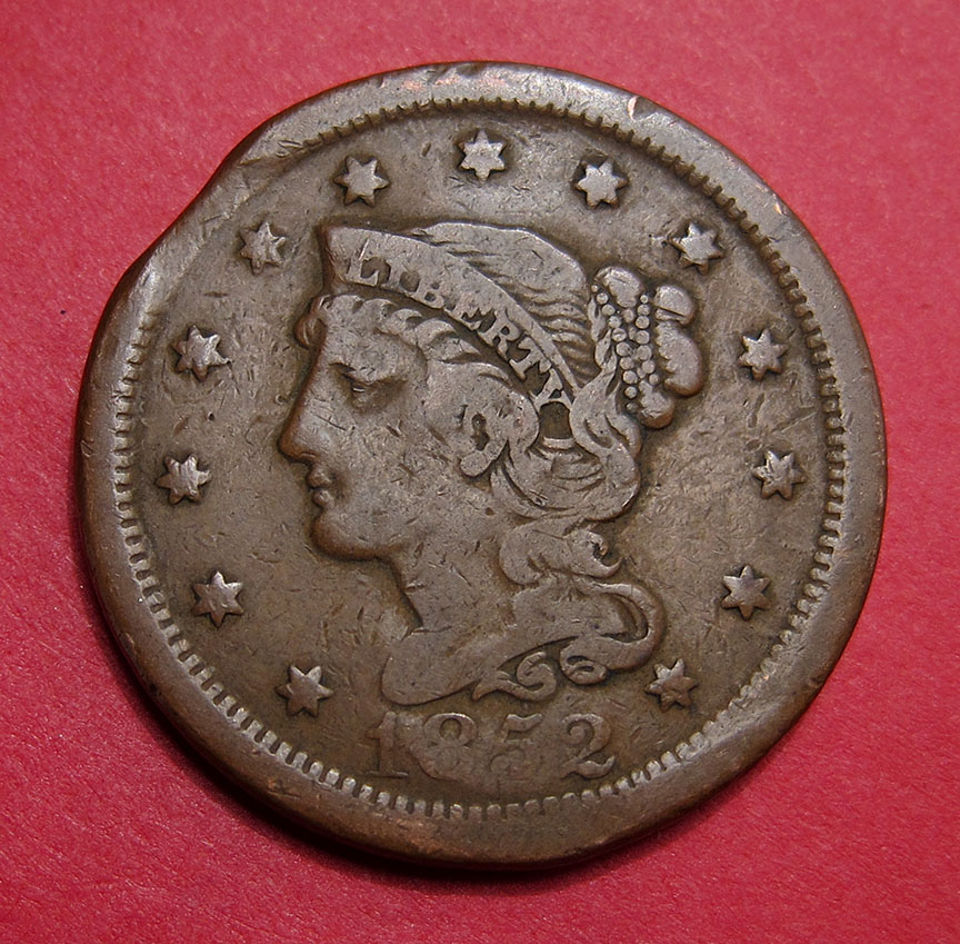 1852-Large-Cent-Mint-Error---Clipped-Planchet-Plus-Counterstamp