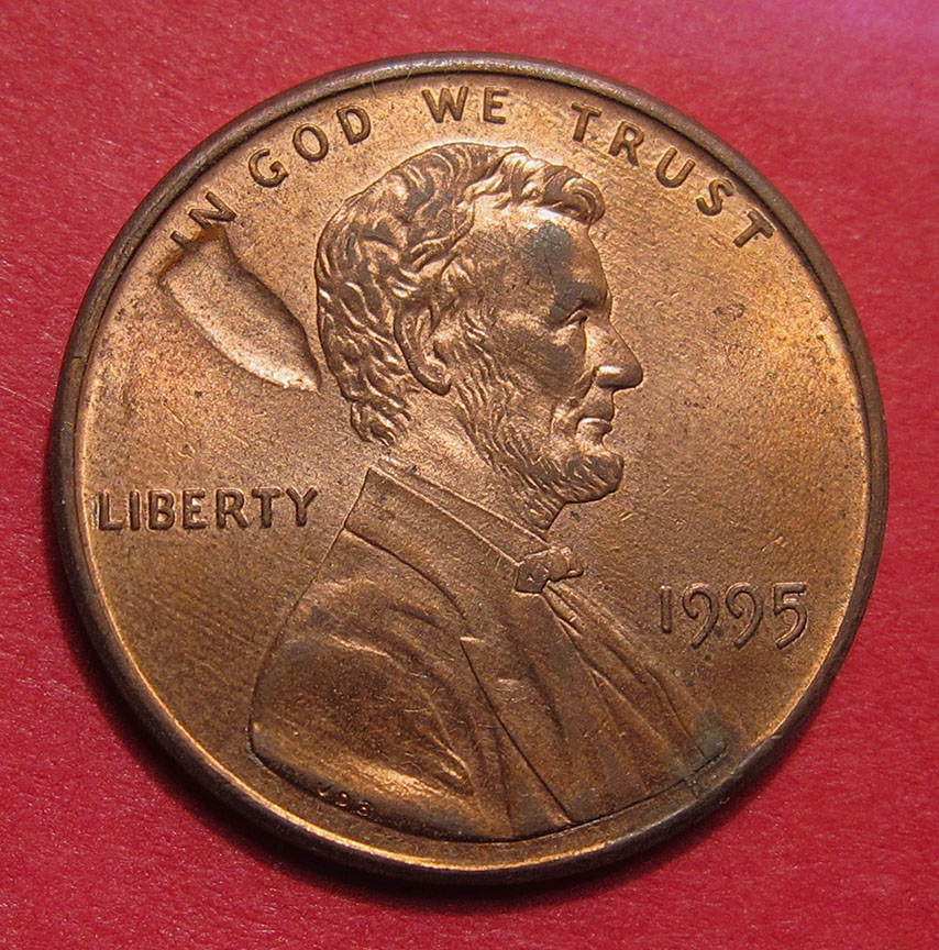 1995-Lincoln-Memorial-Cent-Mint-Error---Struck-Through-Debris