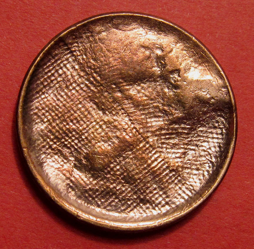 No-Date-Lincoln-Memorial-Cent-Mint-Error---Struck-Through-Cloth