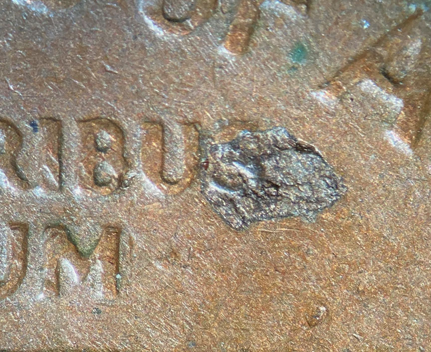1964-D-Lincoln-Memorial-Cent-Mint-Error---Struck-Through-Metal-Debris