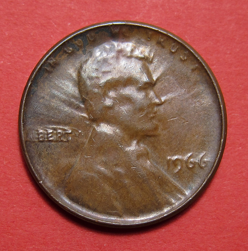 1966-Lincoln-Memorial-Cent-Mint-Error---Struck-Through-Late-Stage-Die-Cap