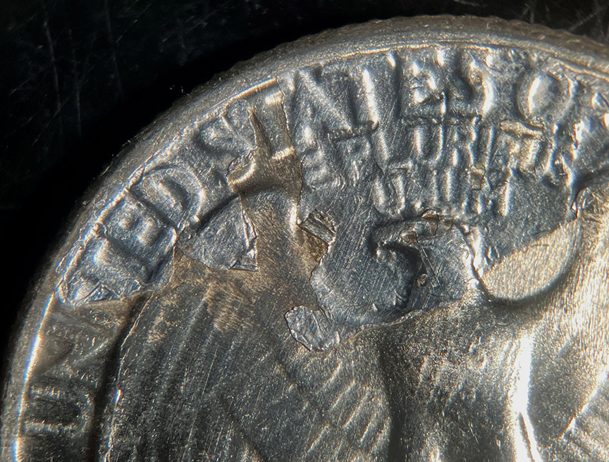 1948-Washington-Quarter-Mint-Error---Struck-Through-Retained-Metal