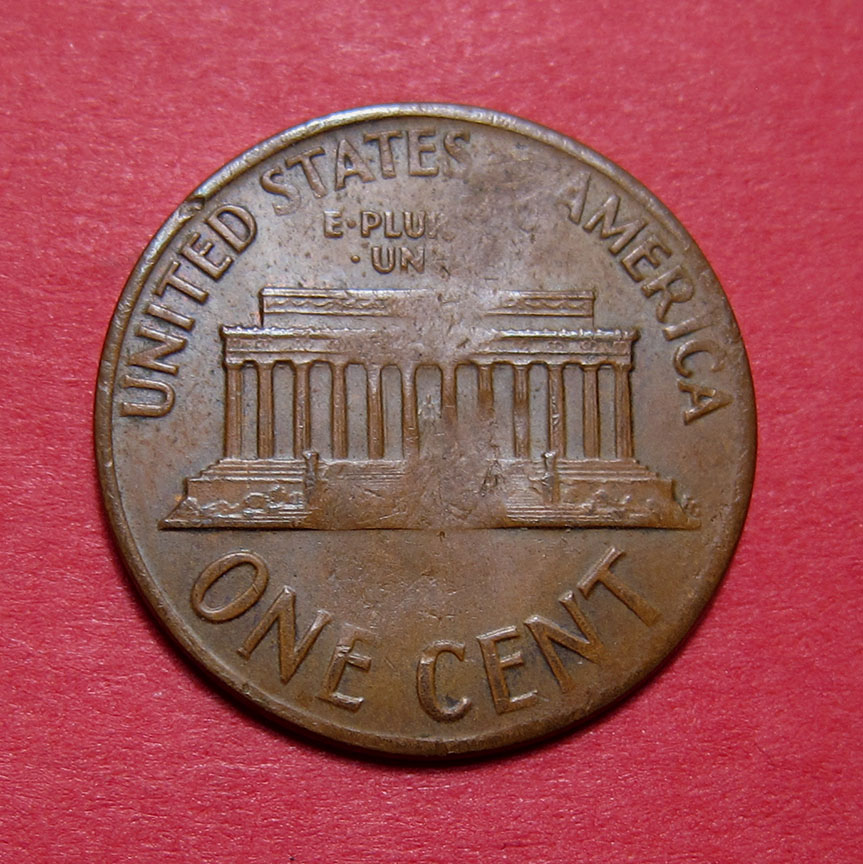 1959-Lincoln-Memorial-Cent-Mint-Error---Struck-Through-Split-Planchet-W/Superman-Retained