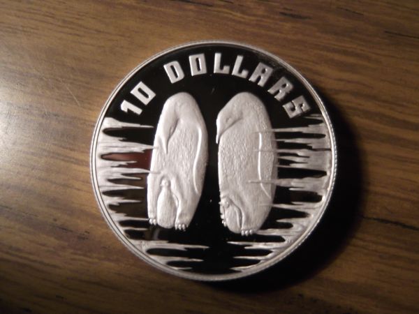 Post-Your-World-Coins-With-Penguins