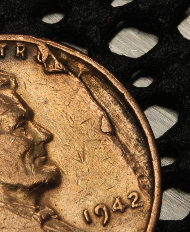 1942-Cent-With-Metal-Pulled-Back?