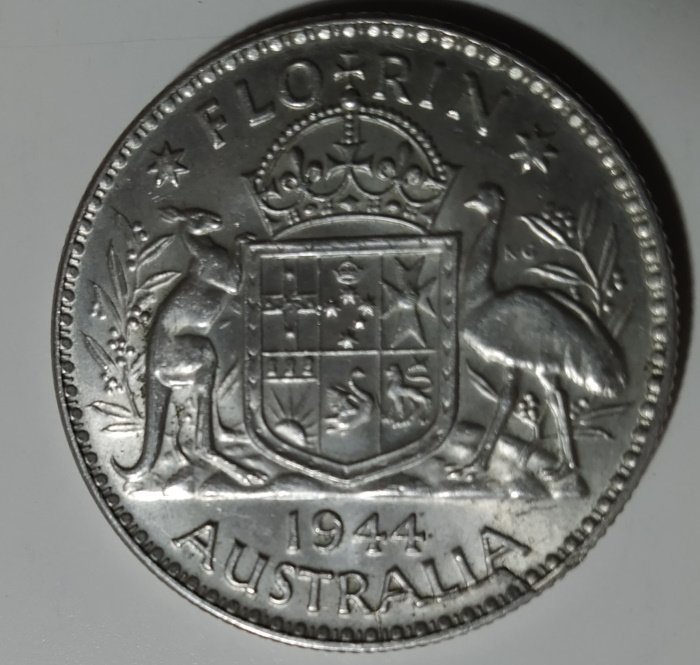 Grading-For-This-1944-Florin-With-A-Good-Die-Crack-Happening