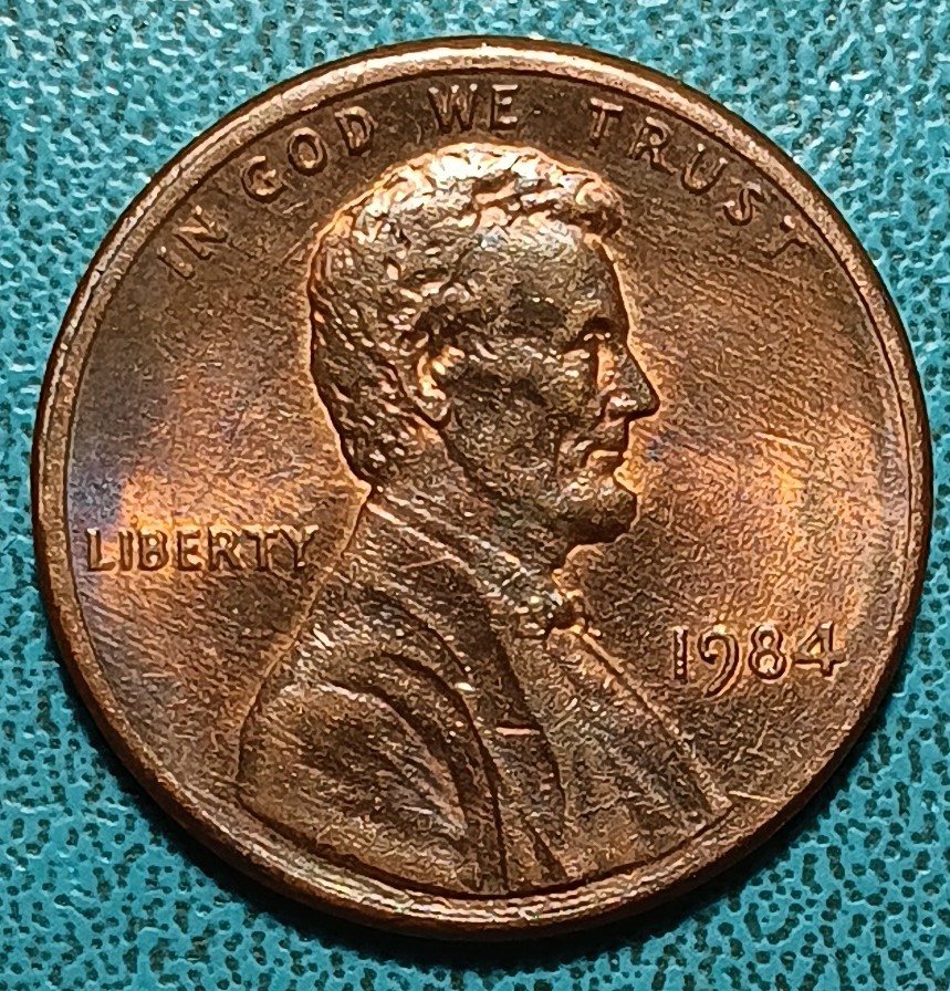 1984-Cent-Bow-Tie-Dot-And-DDD-Date?