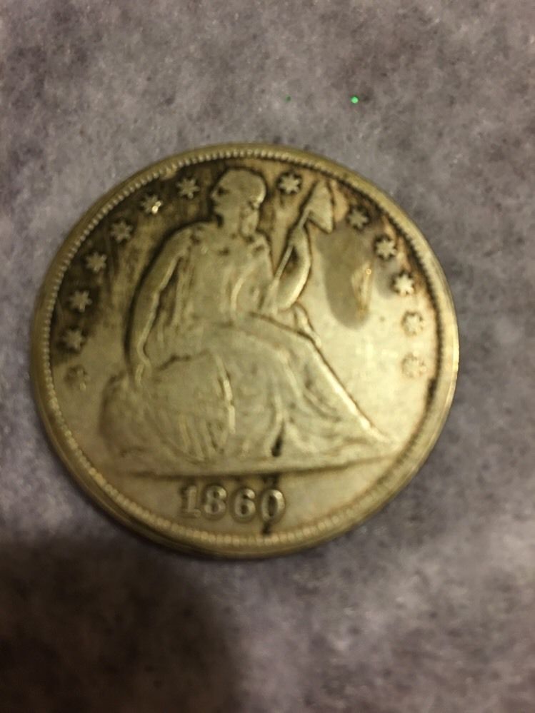 Counterfeit-1860-Liberty-Seated-Dollar