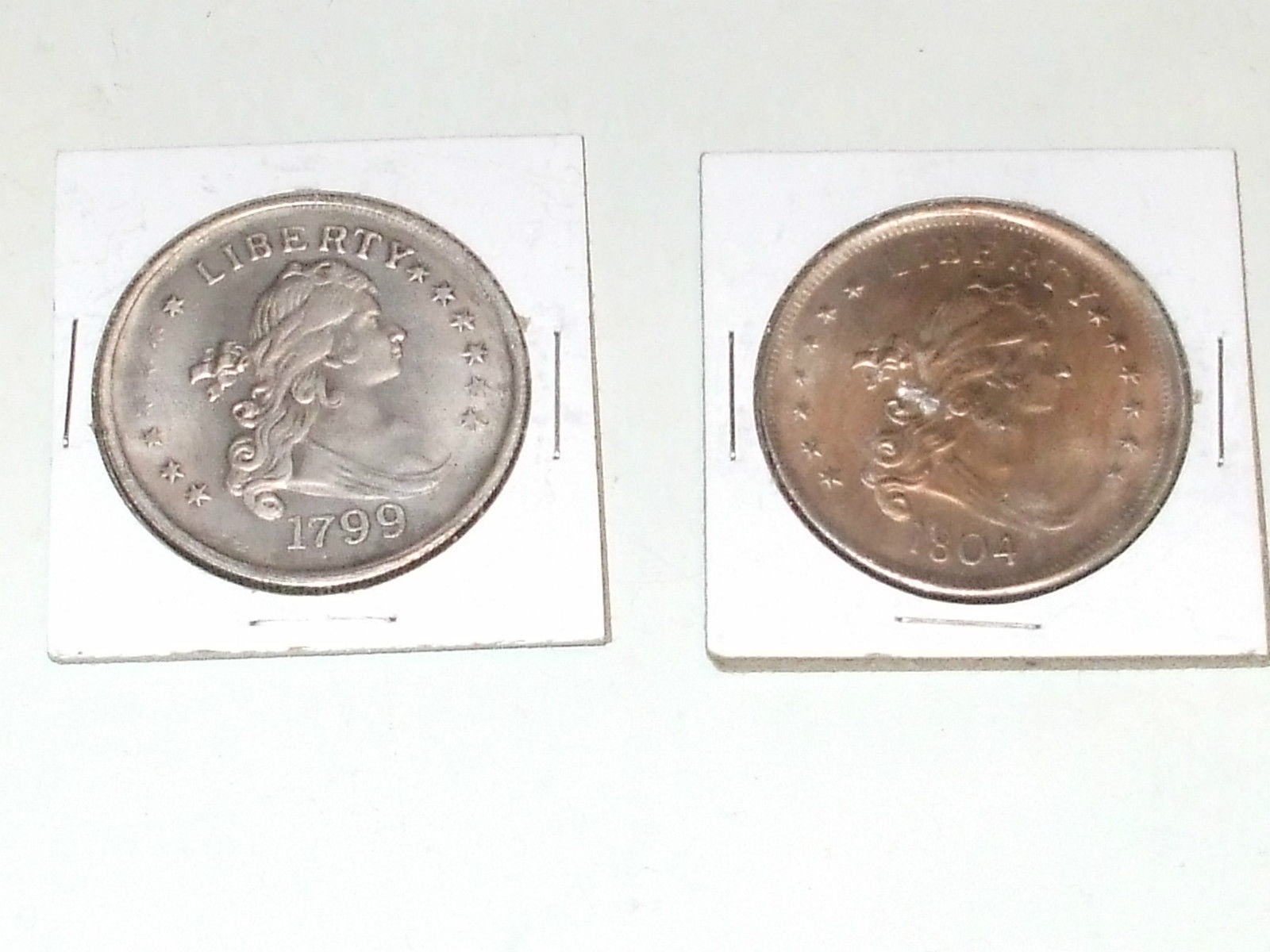 Counterfeit-1799-And-1804-Draped-Bust-Dollars