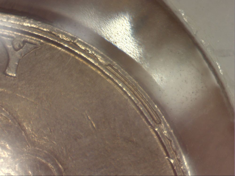 1994-Quarter--Weird-Double-Rim-Thingamajig