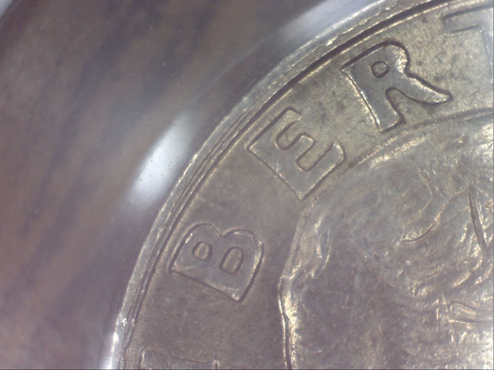 1994-Quarter--Weird-Double-Rim-Thingamajig