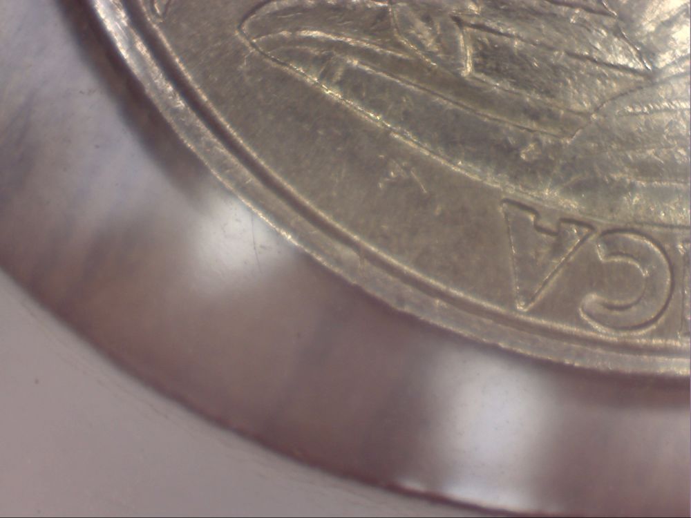 1994-Quarter--Weird-Double-Rim-Thingamajig