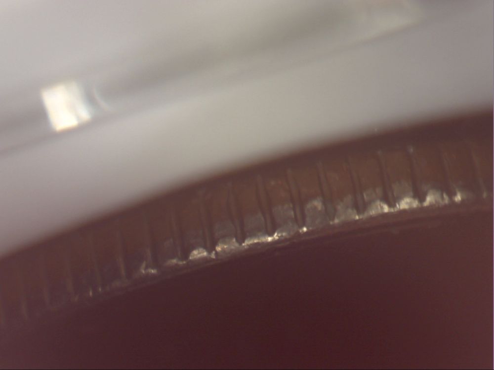 1994-Quarter--Weird-Double-Rim-Thingamajig