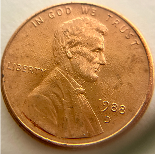 1988-D-Lincoln-Cent-Strikethrough-Error---Cloth?
