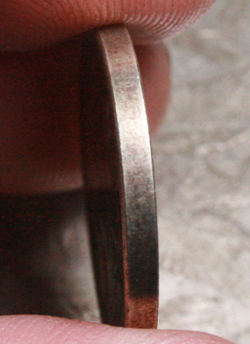 Counterfiet-Or-Worn-Die?