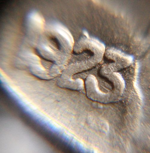 Counterfiet-Or-Worn-Die?