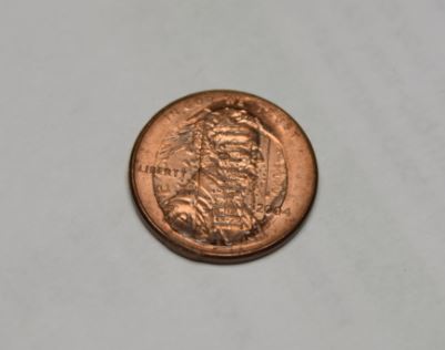 Weird-Error-2004-Penny-Stamped-With-Reverse-Side?