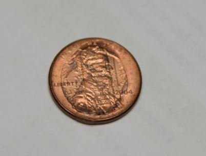 Weird-Error-2004-Penny-Stamped-With-Reverse-Side?