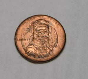Weird-Error-2004-Penny-Stamped-With-Reverse-Side?