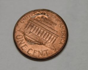 Weird-Error-2004-Penny-Stamped-With-Reverse-Side?