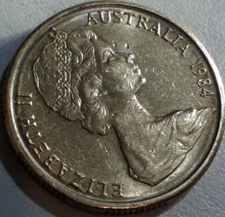 1984--$1-One-Dollar-Circular-Die-Error?