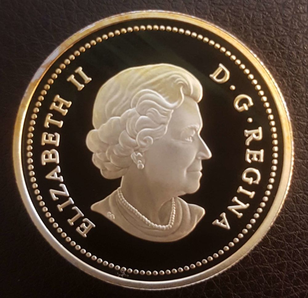 Strange-Toning-Pattern-On-Silver-Dollar
