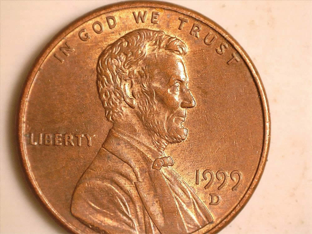 1999-D-Cent-Struck-Through-Or-Lamination?