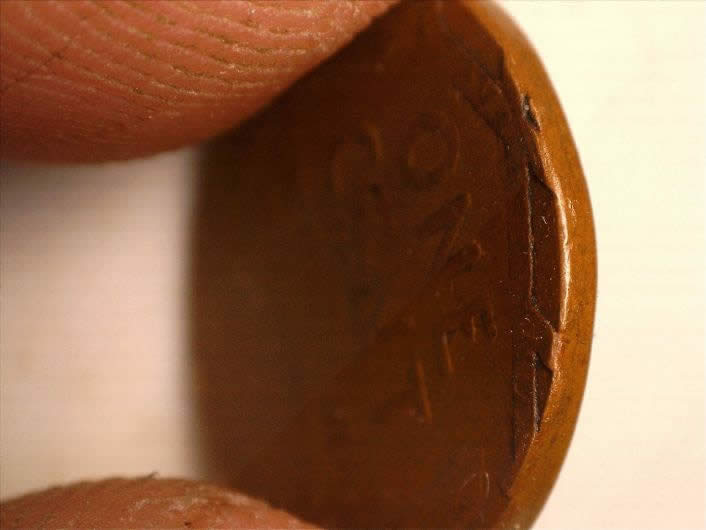 Help-With-A-1941-Cent-Struck-On-A-Foreign-Stock.